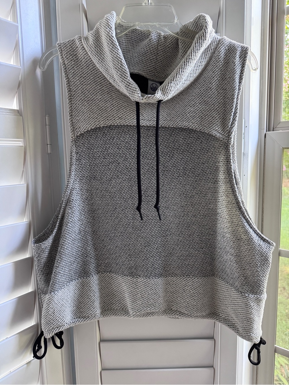 Te Verde knit vest with wide arm holes. Large